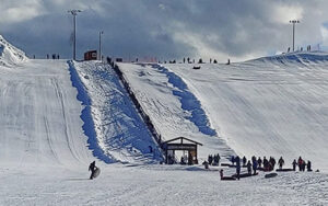 Snow tubers on the lift
